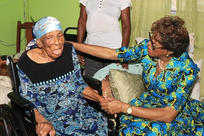 Dame Cynthia Pratt meets Muriel Deleveaux, 93 years, while on visit to Crooked Island